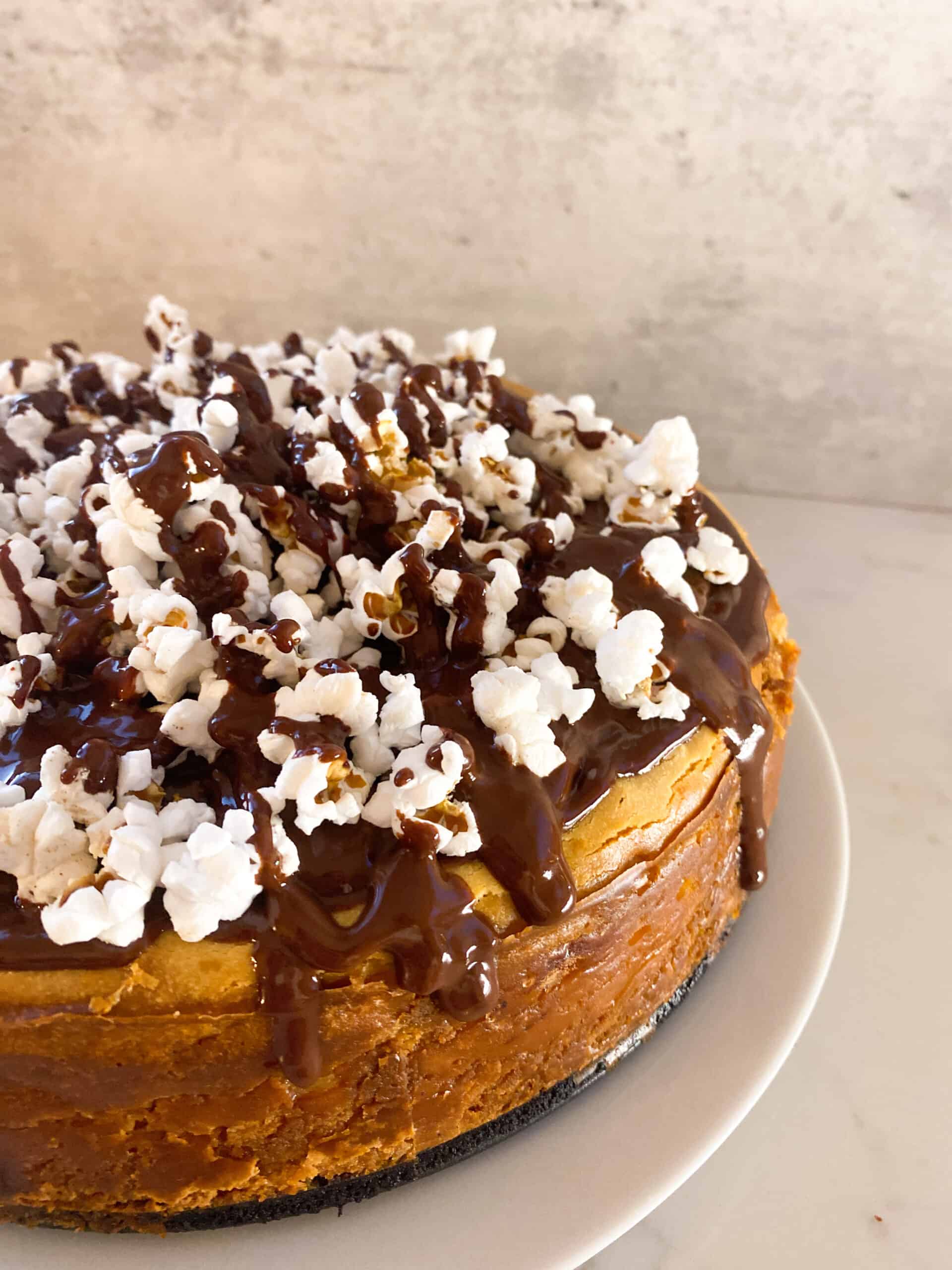 Chocolate Peanut Butter Cheesecake with Popcorn on Top | CC's Table