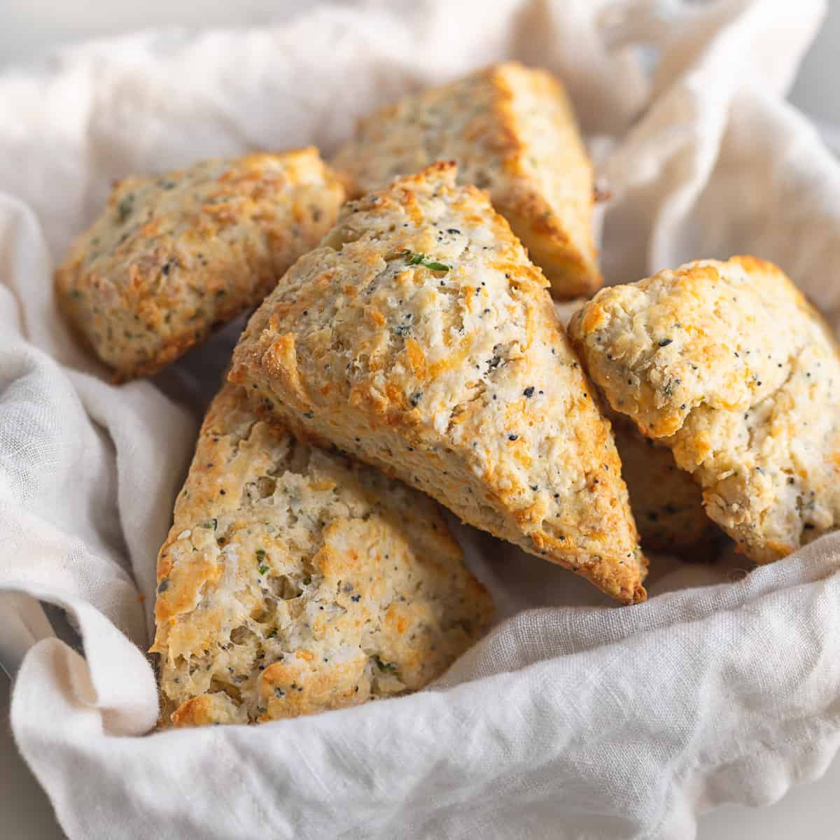 cheddar chive scones with everything bagel seasoning in a basket